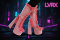 Pink platform boots with red fuzzy trim 