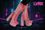 Pink platform boots with red fuzzy trim 