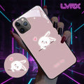 Phone case with a cute rabbit design and 'Hug Me' text, held by a person.