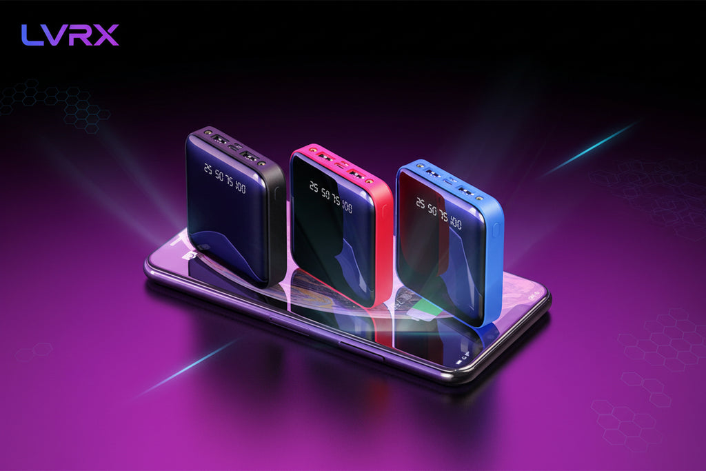 Three portable power banks in blue, red, and black on a reflective surface with a purple gradient background.