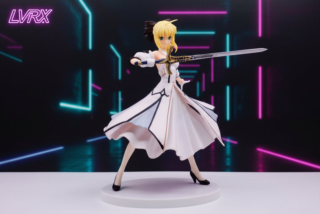Anime character figurine with a sword in front of promotional material