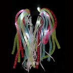 Colorful LED ribbon streamers on a black background