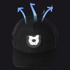 Black cap with a reflective badge on a light blue background