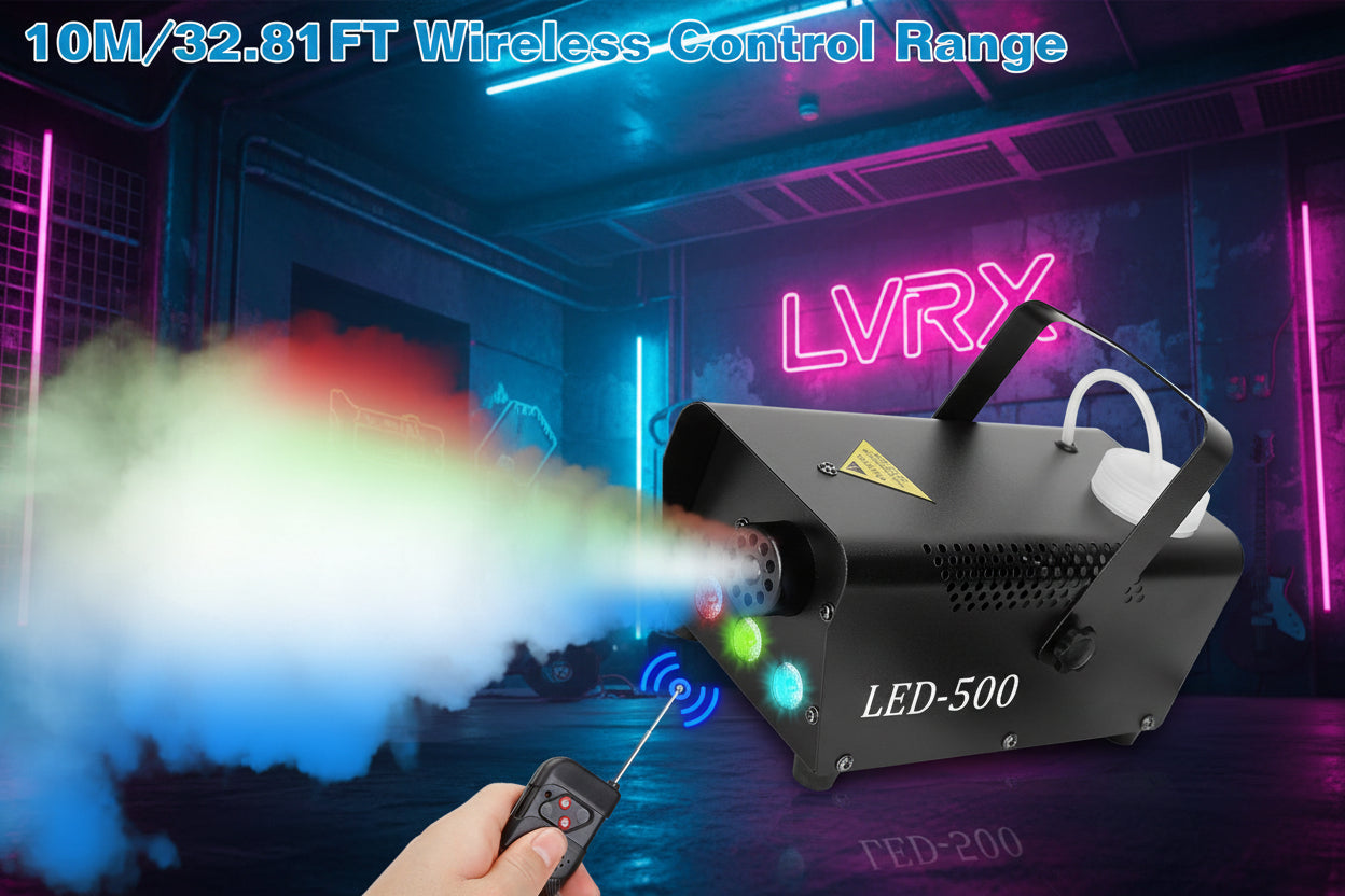 Black fog machine with LED lights and remote control, emitting colorful smoke in a dark setting.
