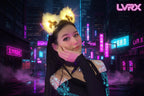 Person wearing illuminated bunny ears with bows on a black background