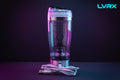 Shaker bottle with measurement markings and USB cable on a white background