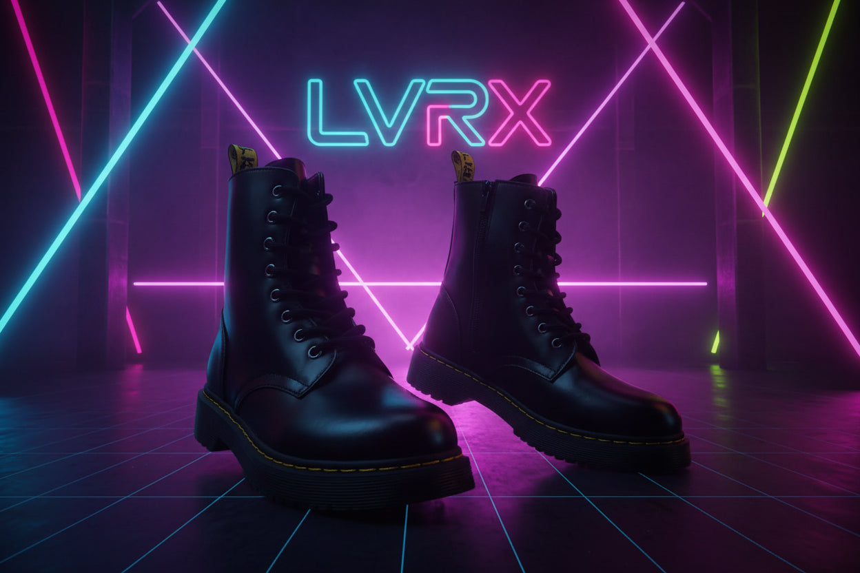 Pair of black leather boots with yellow accents 